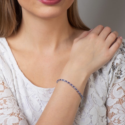 Bransoletka tenisowa SAVICKI: białe złoto, tanzanity, diamenty